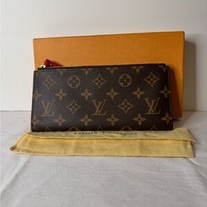 Louis Vuitton Adele Wallet
Double Zip And A Snap. (Raspberry)